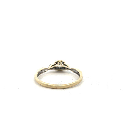 9ct yellow gold diamond ring with 0.33 carats, size S, featuring a central diamond in a classic design.