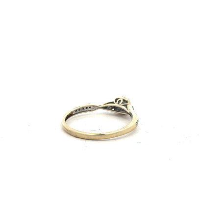 9ct yellow gold diamond ring with 0.33 carat center stone, size S, unbranded, featuring a sleek band and sparkling diamonds.