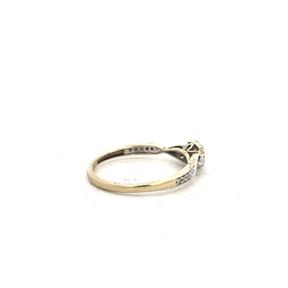 9ct yellow gold diamond ring with 0.33 carat center stone, size S, featuring elegant design and sparkling gemstones.