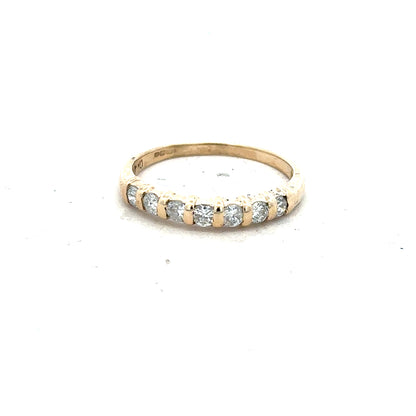 9ct yellow gold diamond ring with 0.40 carat stones, size N, featuring a classic design and unbranded craftsmanship.