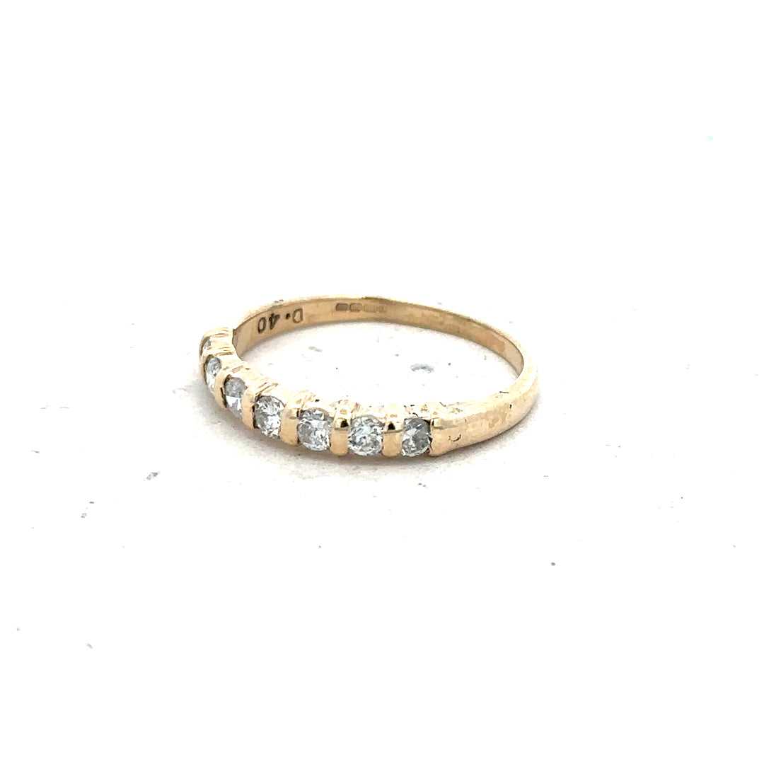 9ct yellow gold diamond ring with 0.40 carats of diamonds in size N, featuring a sleek and elegant design.