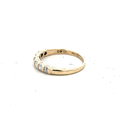 9ct yellow gold diamond ring with 0.40 carats, size N, featuring a sparkling central diamond and elegant band design.