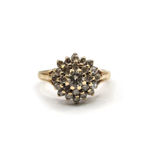 9ct yellow gold diamond cluster ring with 1-carat sparkling diamonds, featuring a classic and elegant design.