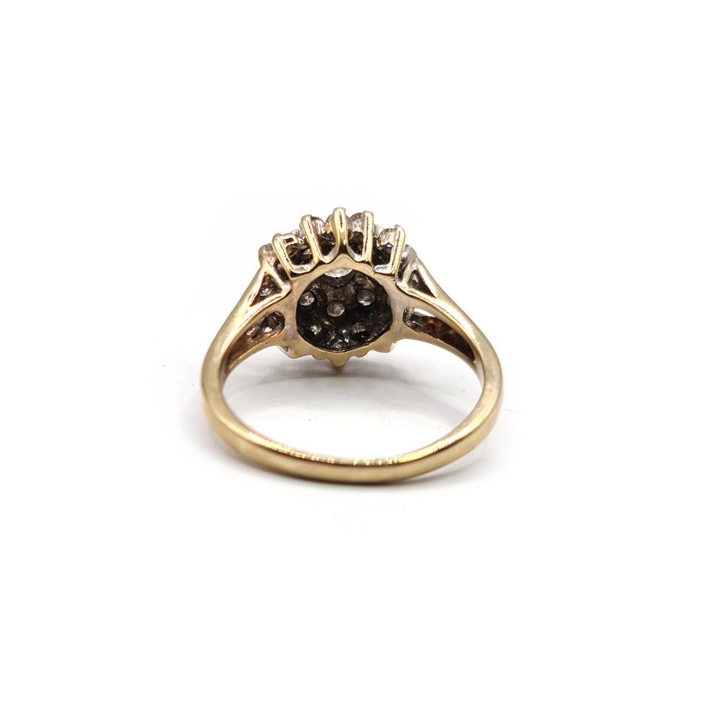 9ct yellow gold diamond cluster ring with 1-carat total weight, featuring a sparkling diamond design and a polished band.