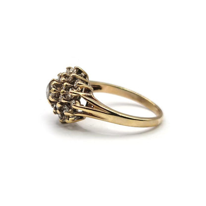9ct yellow gold diamond cluster ring with 1-carat total weight, featuring a sparkling diamond design on a stylish band.