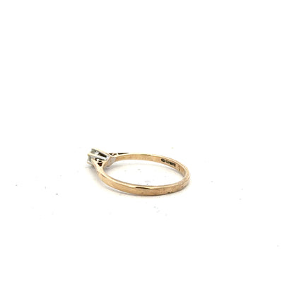 9ct yellow gold diamond ring with 20pts sparkling stones in size N1/2, showcasing elegant jewelry design.