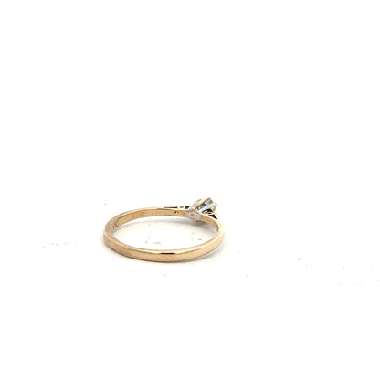 9ct yellow gold diamond ring with 20pts diamonds in size N 1/2, showcasing a polished gold band with sparkling stones.