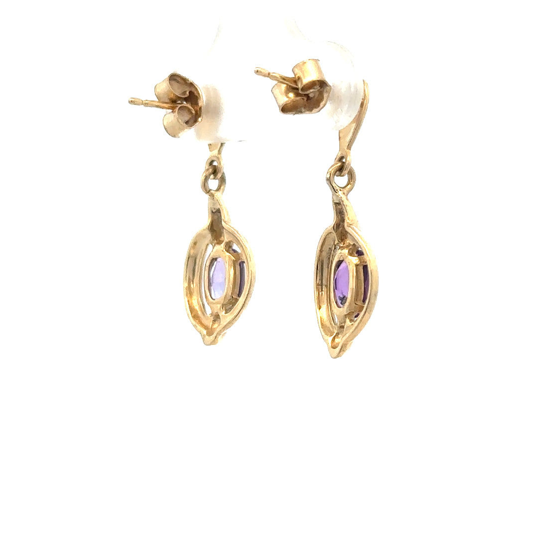 9ct yellow gold amethyst earrings with purple gemstones, featuring a simple stud design and a total weight of 2.1 grams.