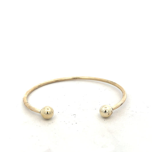 9ct yellow gold bracelet bangle weighing 12.7g, unbranded jewelry accessory with a smooth, polished finish.