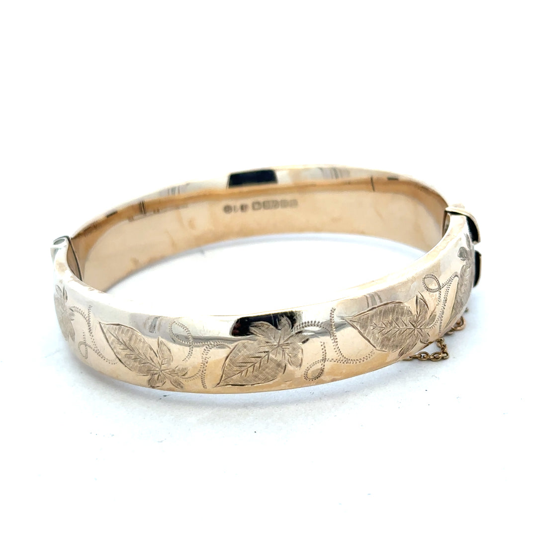 9ct yellow gold bracelet bangle weighing 20.3g, unbranded, with a sleek, polished finish and classic design.