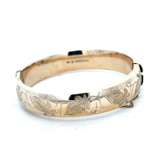 9ct yellow gold bracelet bangle weighing 20.3g, unbranded, with a sleek, polished finish and classic design.