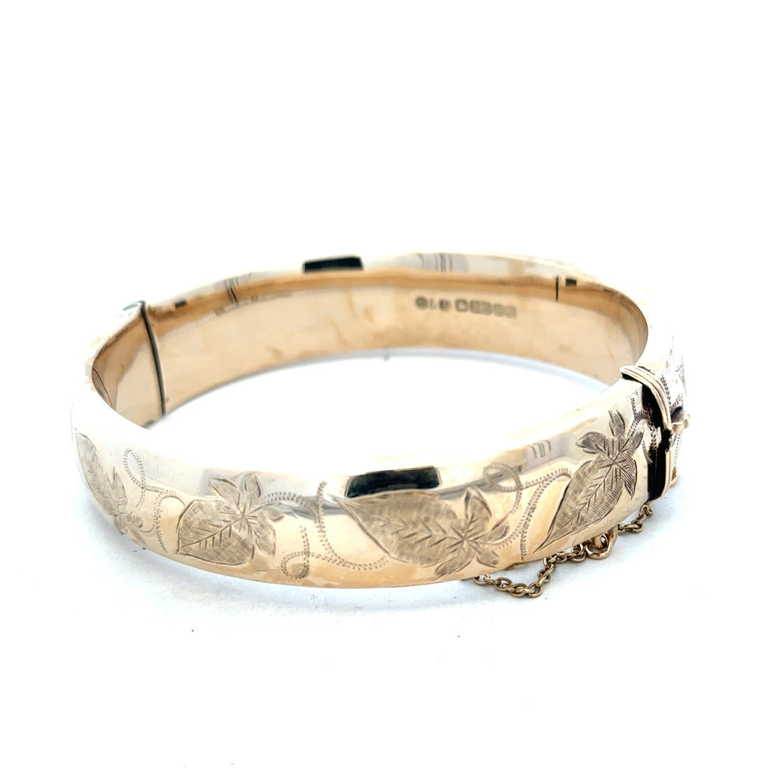 9ct yellow gold bracelet bangle weighing 20.3g, unbranded, with a smooth polished finish and classic design.