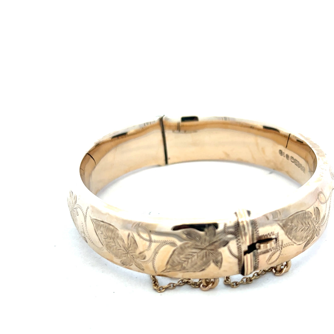 9ct yellow gold bracelet bangle weighing 20.3g, unbranded, with a smooth, polished finish and rounded design.