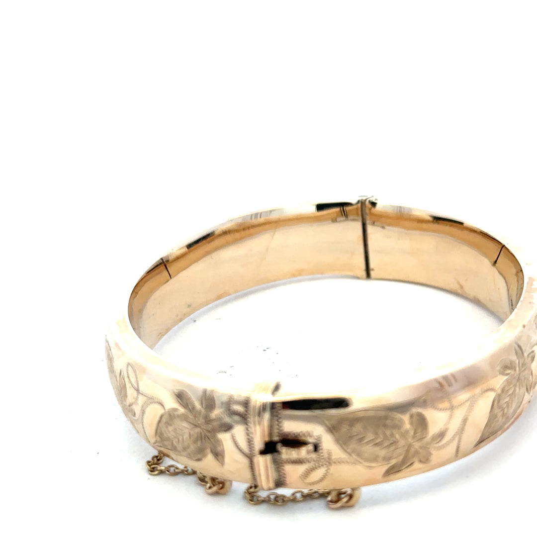 9ct yellow gold bracelet bangle weighing 20.3g, unbranded jewelry accessory with a smooth, polished finish