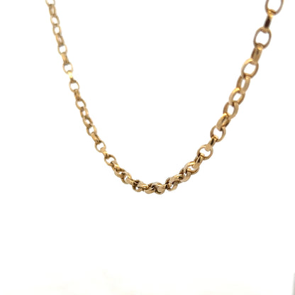 Unbranded 9ct yellow gold belcher chain with pendant, lightweight jewelry, close-up showing chain links and polished finish
