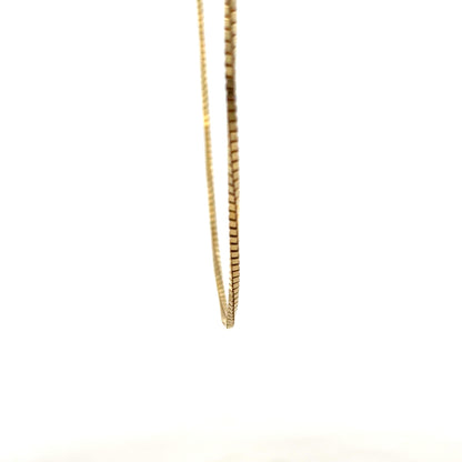 9ct yellow gold box chain, unbranded, 6.4g, close-up view showing the polished gold links and chain design.