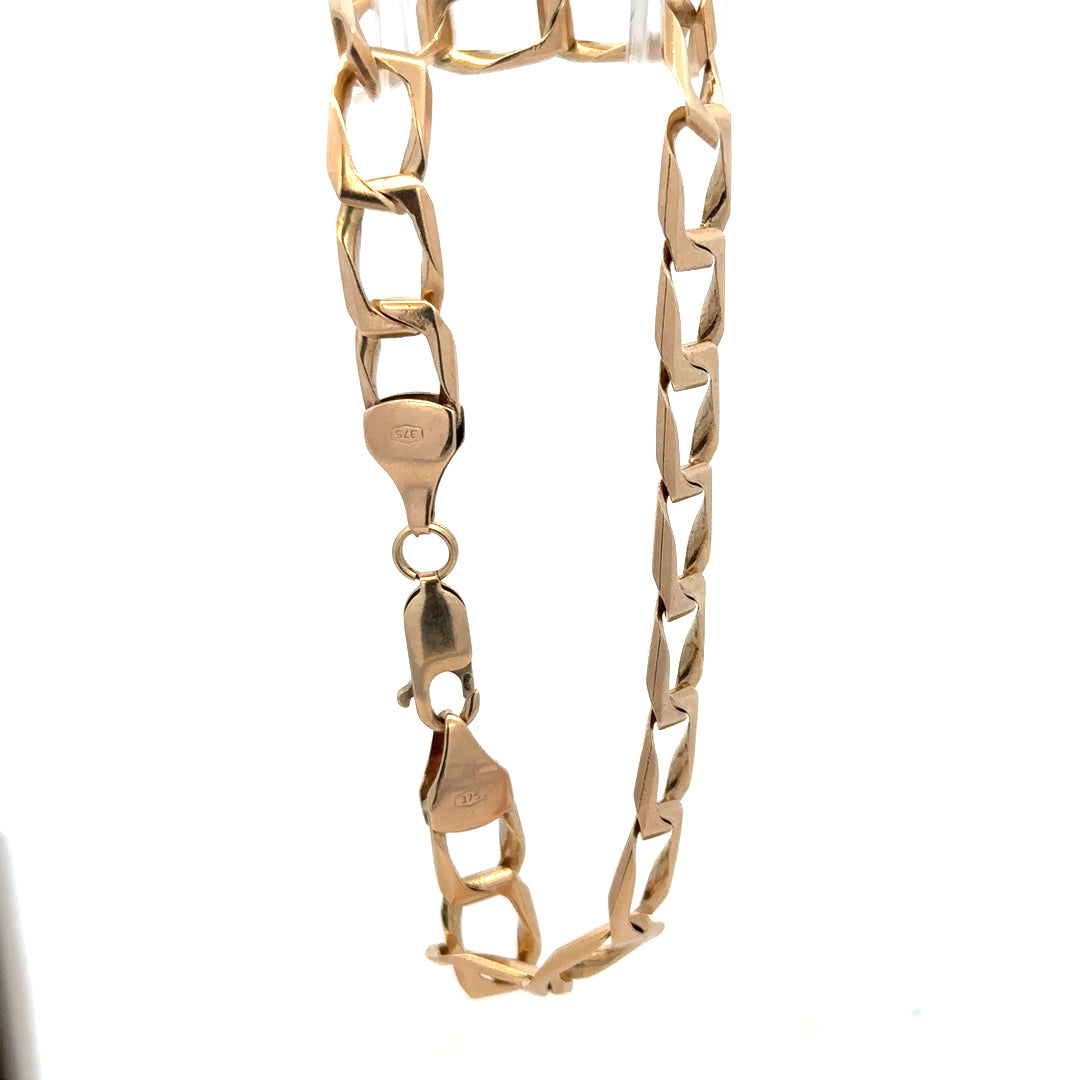 9ct yellow gold bracelet weighing 13.3g, unbranded jewelry piece featuring a sleek, polished design.