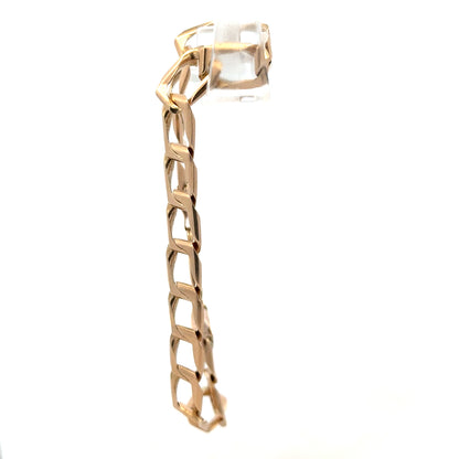 Unbranded 9ct yellow gold bracelet weighing 13.3g, featuring a sleek and elegant design, displayed against a neutral background.