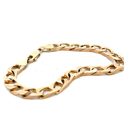 9ct yellow gold bracelet weighing 22.4g, featuring a classic chain design, unbranded jewelry piece displayed on a neutral background.