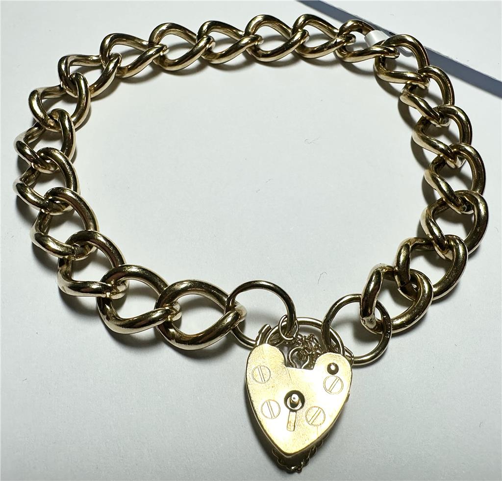 9ct yellow gold bracelet with a smooth design, weighing 26.3 grams, crafted in unbranded jewelry style.