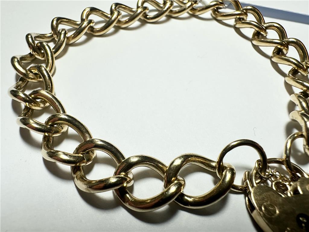 9ct yellow gold bracelet weighing 26.3g, unbranded, with intricate design visible in the image.
