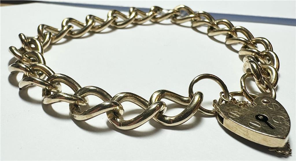 9ct yellow gold bracelet with a 26.3g weight, showcasing a sleek and elegant design in a natural unbranded style.