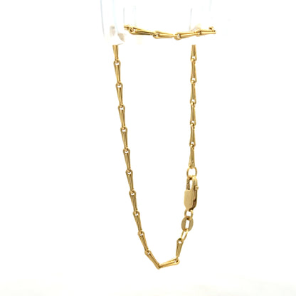 9ct yellow gold bracelet weighing 3.5g, featuring a sleek design, unbranded jewelry piece, shown in this close-up image.