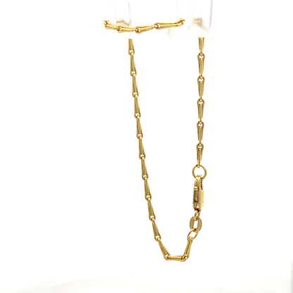 9ct yellow gold bracelet weighing 3.5g, featuring a simple chain design, unbranded jewelry piece, shown in close-up.