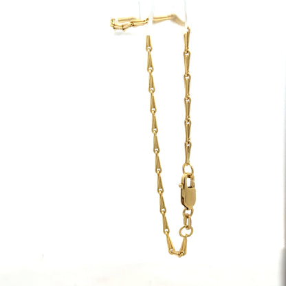 9ct yellow gold bracelet weighing 3.5g, unbranded, with a simple chain design, displayed on a white background.