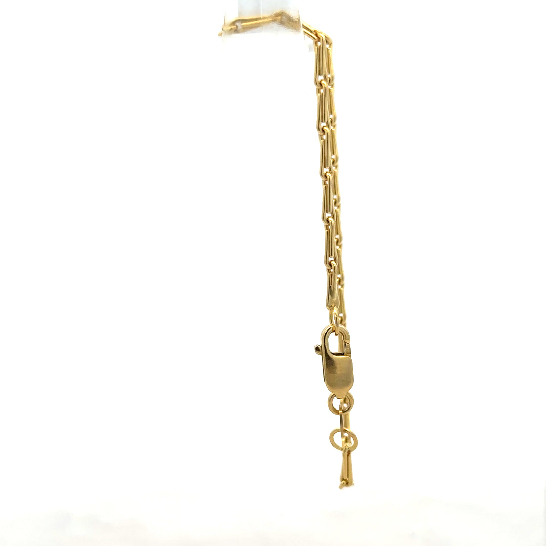 9ct yellow gold bracelet, unbranded, with a delicate chain design, weighing 3.5g, displayed against a neutral background.