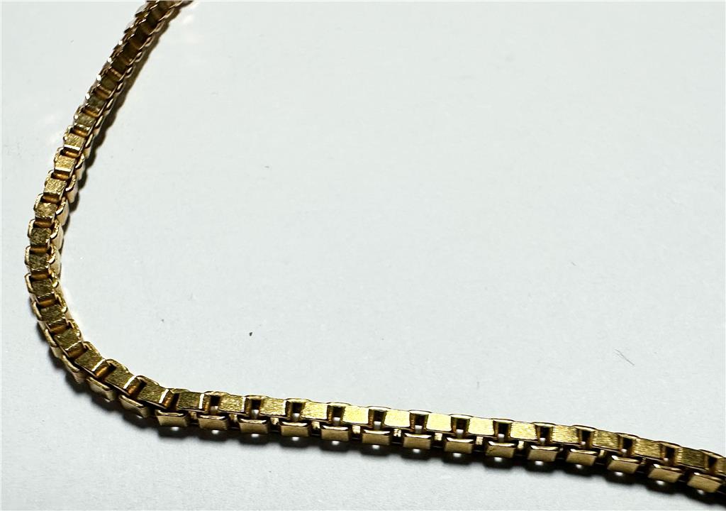 Yellow gold bracelet weighing 3.7g, unbranded 9ct gold jewelry, shown in a close-up image highlighting its design and finish.