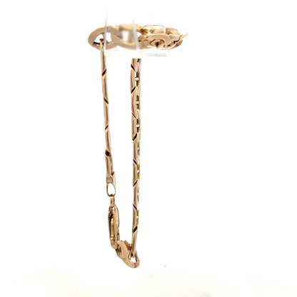 9ct yellow gold bracelet with a sleek design, weighing 8.6g, showcasing a stylish unbranded jewelry piece.