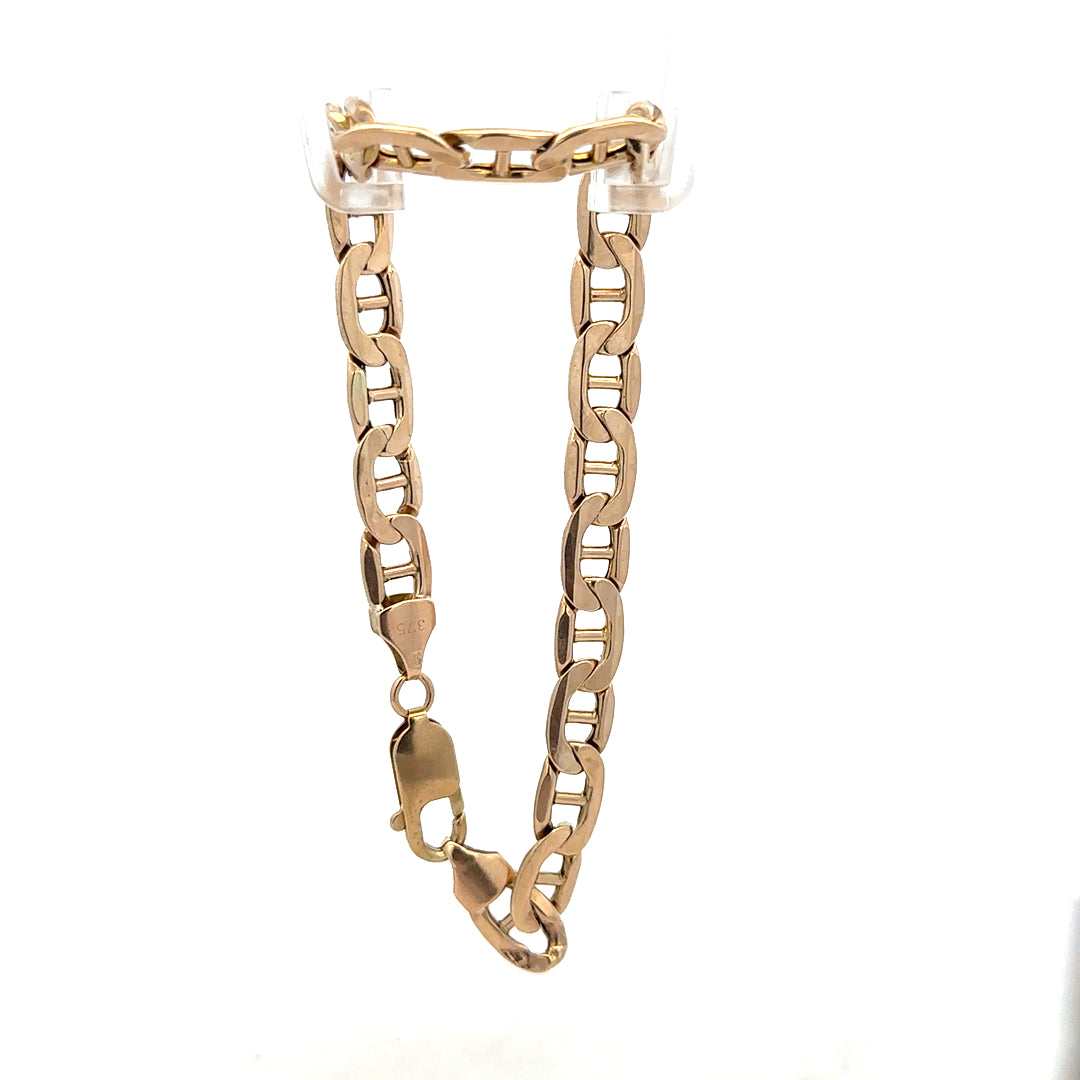 9ct yellow gold bracelet weighing 8.6g, unbranded jewelry accessory with a classic design, shown in a close-up image.