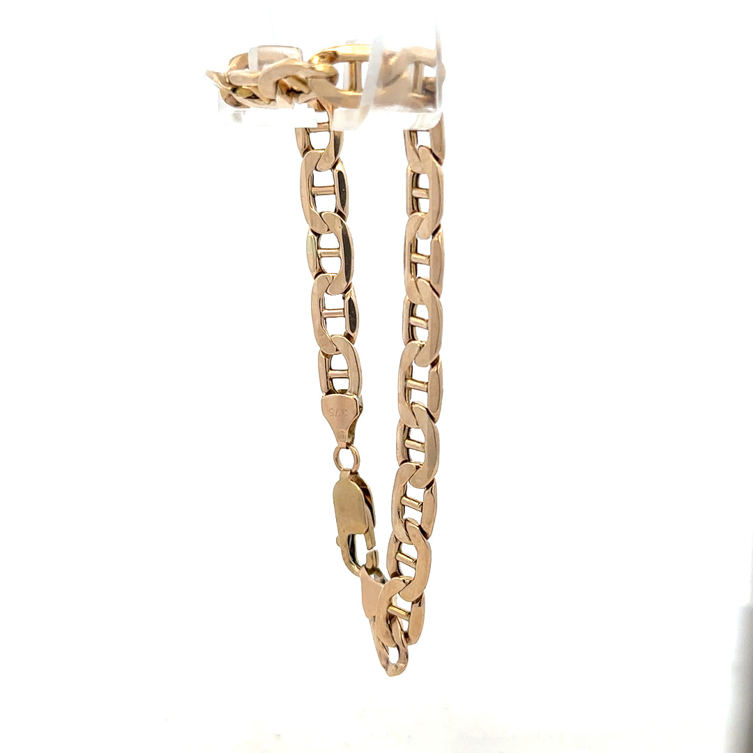 9ct yellow gold bracelet with 8.6g weight, featuring a classic design, unbranded jewelry accessory, shown in the image.
