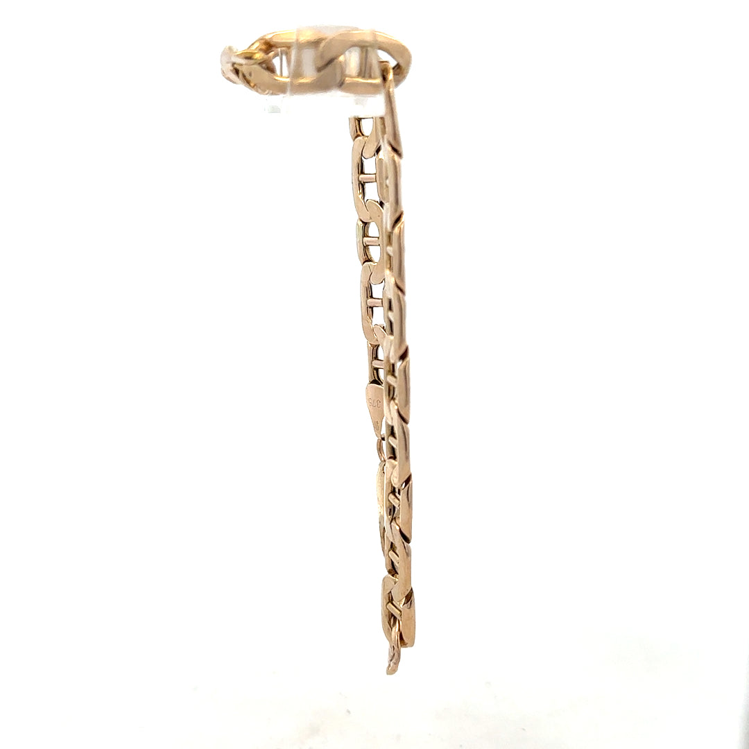 9ct yellow gold bracelet weighing 8.6g, unbranded jewelry accessory with a polished finish and delicate chain design.