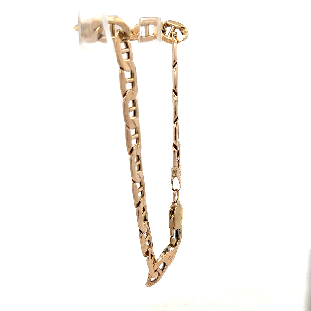 9ct yellow gold bracelet weighing 8.6g, unbranded, with a classic design, shown in a detailed product image.