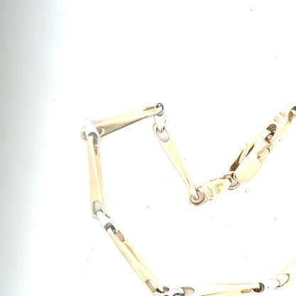 9ct yellow gold bracelet, unbranded, weighing 8.9g, with a sleek, polished design visible in the image.