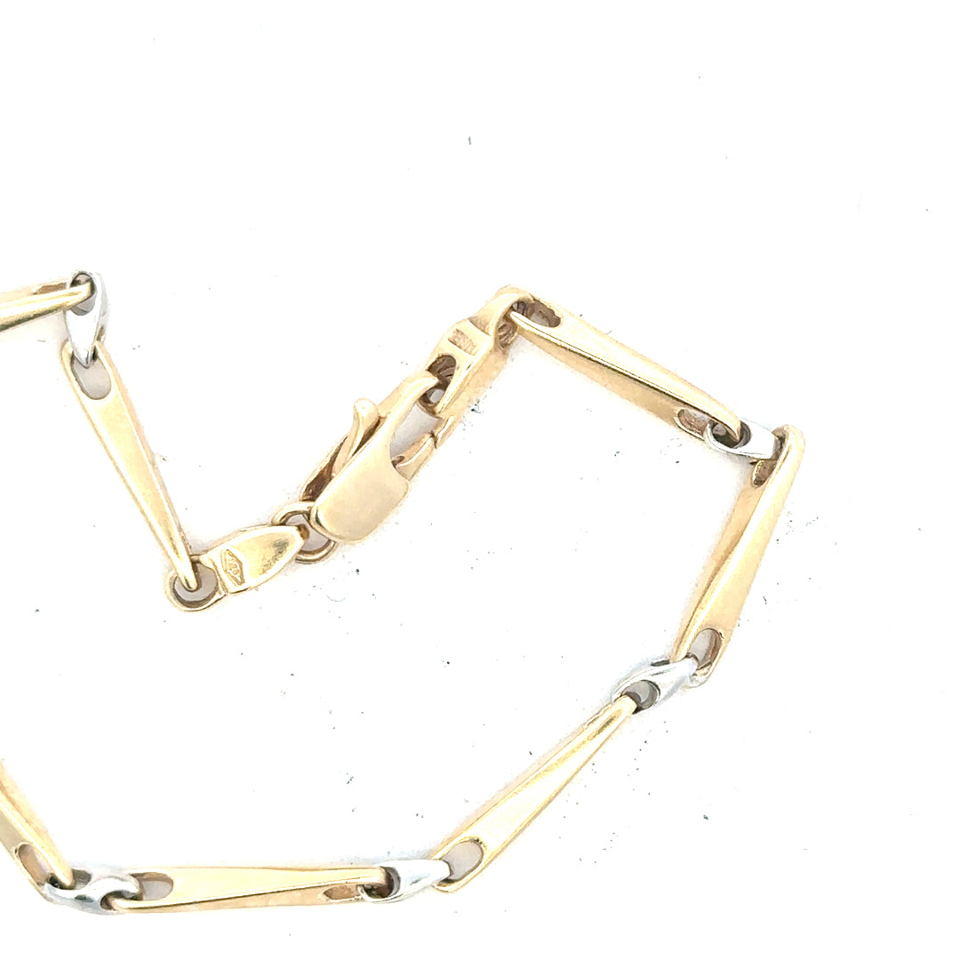 9ct yellow gold bracelet, unbranded, weighs 8.9g, with a sleek design, displayed on a plain background.