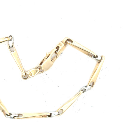 9ct yellow gold bracelet, unbranded, weighs 8.9g, with a sleek design, displayed on a plain background.