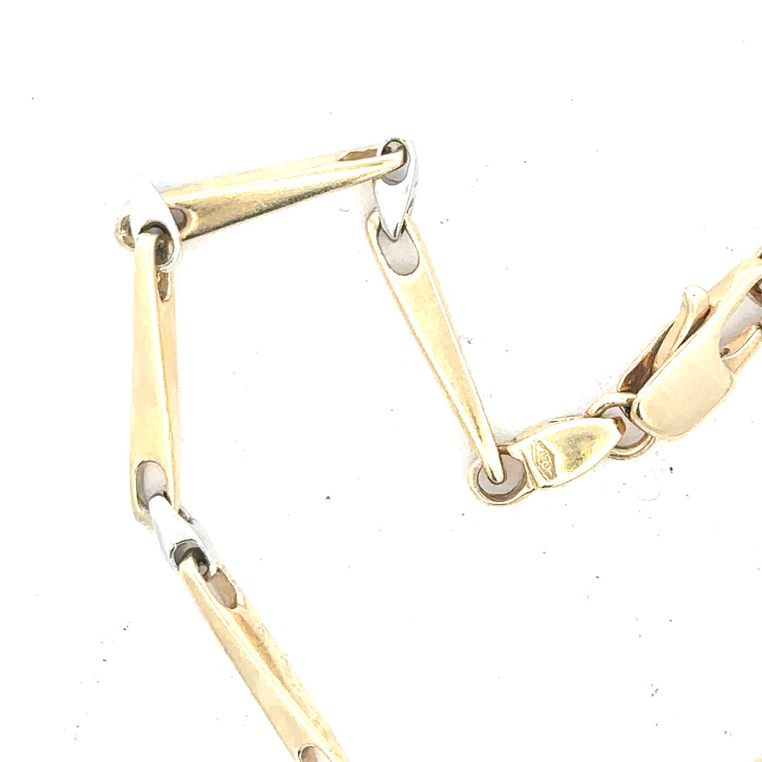 9ct yellow gold bracelet weighing 8.9g, featuring a sleek chain design, unbranded jewelry accessory.