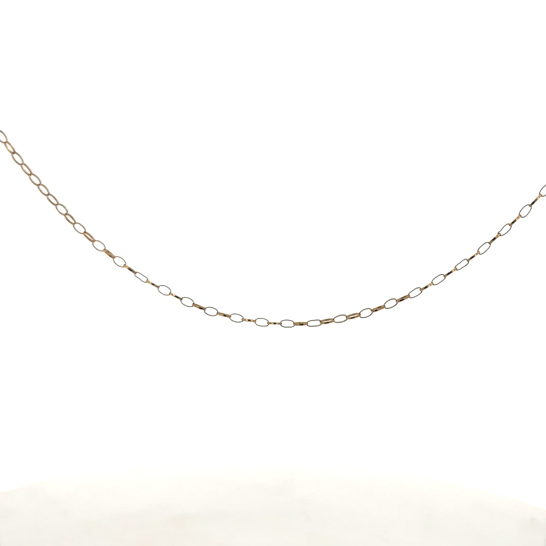 9ct yellow gold chain, lightweight jewelry piece weighing 0.7g, featuring a classic chain design with a smooth finish.