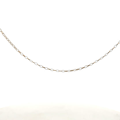 9ct yellow gold chain, lightweight jewelry piece weighing 0.7g, featuring a classic chain design with a smooth finish.