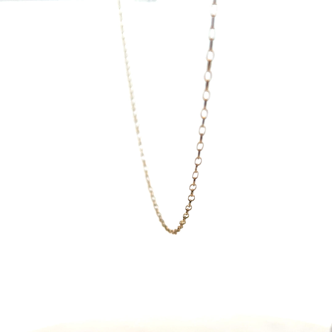 9ct yellow gold chain with delicate links, weighing 0.7g, showcasing a simple and elegant jewelry design.