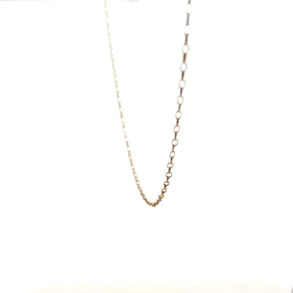 9ct yellow gold chain with delicate links, weighing 0.7g, showcasing a simple and elegant jewelry design.