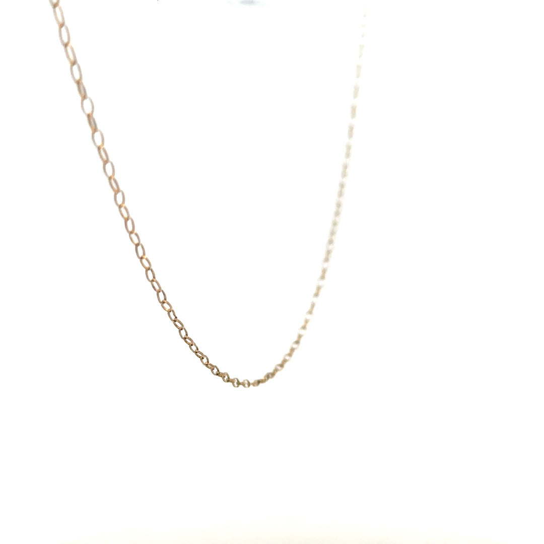 9ct yellow gold chain weighing 0.7g, unbranded, with a classic link design, shown in a close-up view.