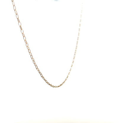 9ct yellow gold chain weighing 0.7g, unbranded, with a classic link design, shown in a close-up view.