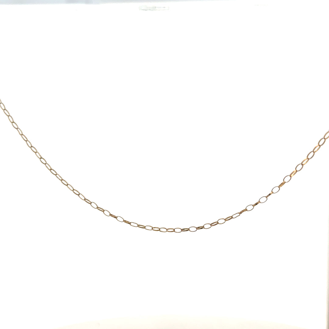9ct yellow gold chain weighing 0.7g, unbranded, with a delicate and shiny design visible in the image.