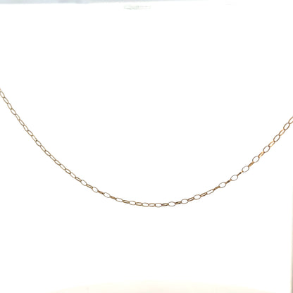 9ct yellow gold chain weighing 0.7g, unbranded, with a delicate and shiny design visible in the image.