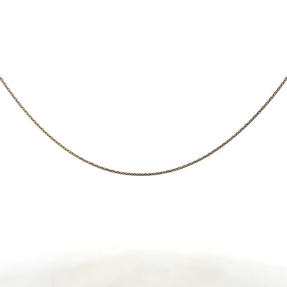 9ct yellow gold chain weighing 1.3g, unbranded, with a detailed close-up showing its fine link design and polished finish.