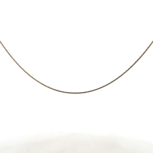 9ct yellow gold chain weighing 1.3g, unbranded, with a detailed close-up showing its fine link design and polished finish.